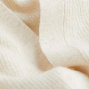 Kofta - En oversized, ribbstickad kofta med V- ringning. Helt ny, aldrig använd.