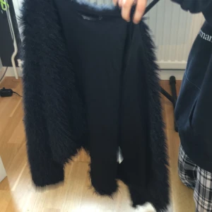 En fllufig jaka  - En jätte fin jacka men inte min stil men har aldrig använd 
