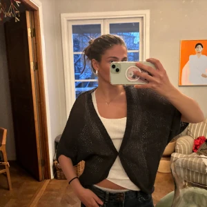 Stickad bolero  - Stickad bolero, oanvänd