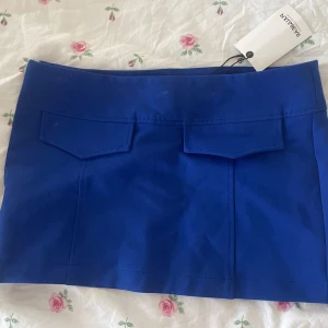 Blå minikjol - Oanvänd minikjol med prislapp kvar💙 Storlek S