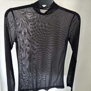 Svart mesh top - Aldrig använd 