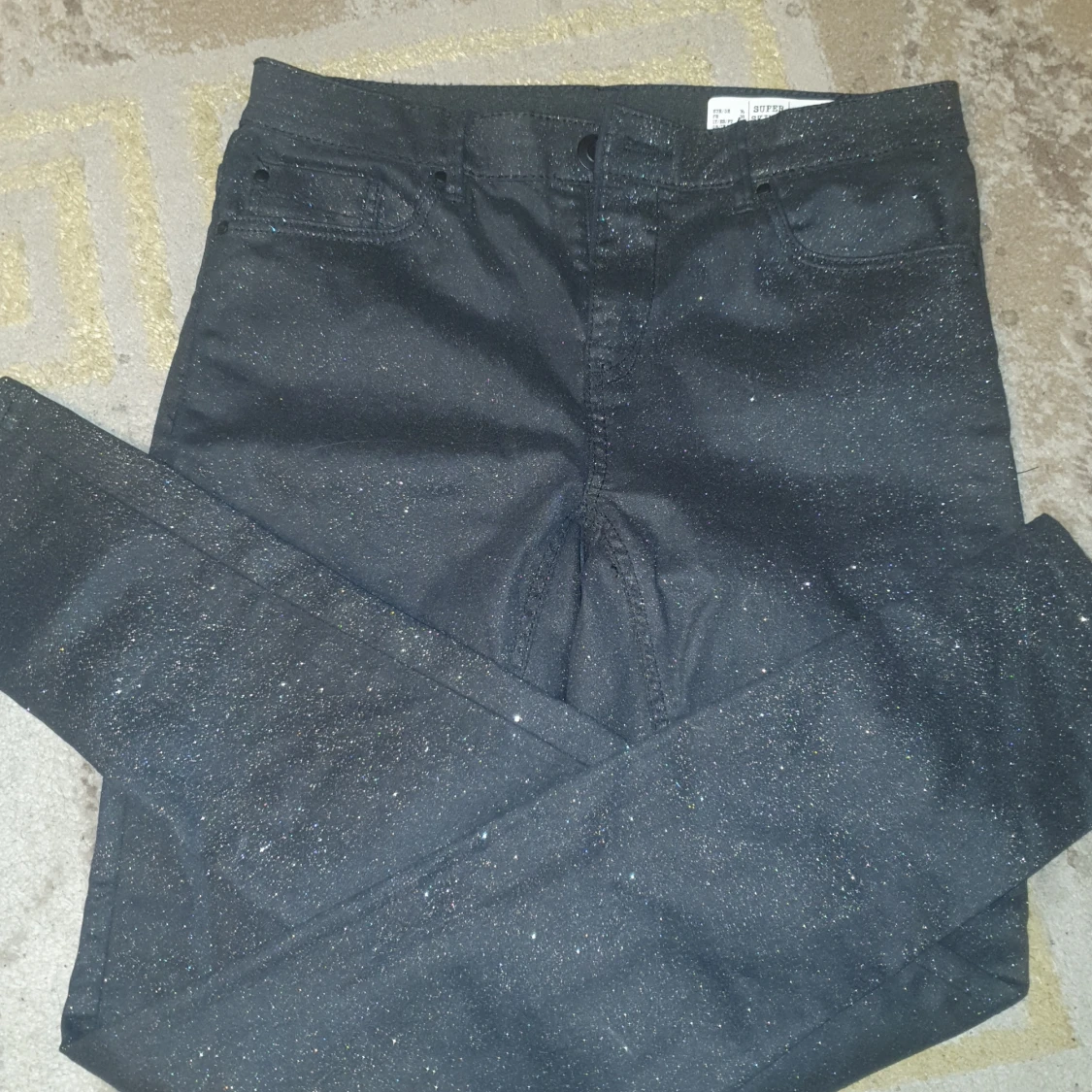 Svarta med massa glitter jeans - 93