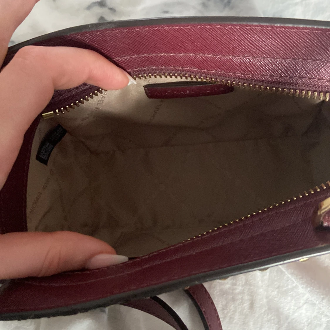 Michael kors axelremsväska  - 91