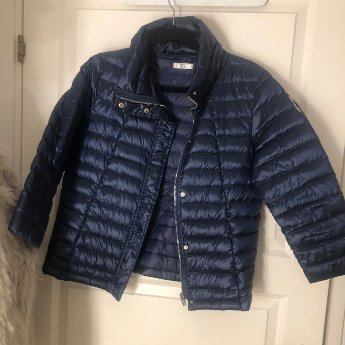 Trekvarts ärmad jacka