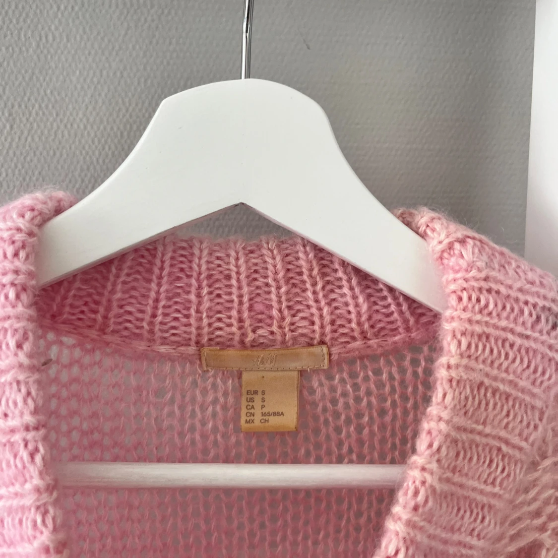 Stickad rosa tröja - 90