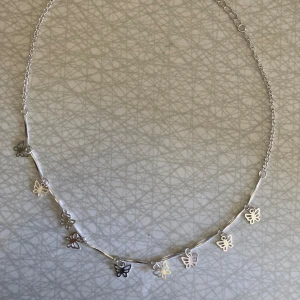 Halsband - Fjärilshalsband superfint