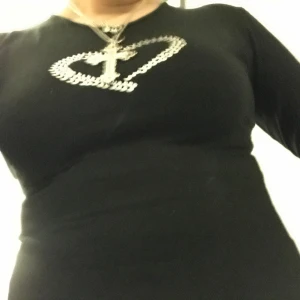 Söt topp  - En as söt topp med ett hjärta av silver på