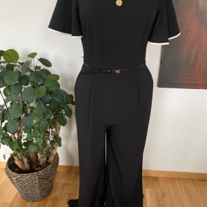 Ny byxdress superfin  - Superfin Calvin Klein  Byxdress i fint fall och superfin kvalitet Lite stretchig