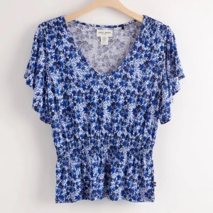 Topp - blommig topp från Lindex 