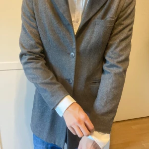 Grå kappa - Grå kappa från Twilfit i gott skick.  Storlek S, funkar som unisex