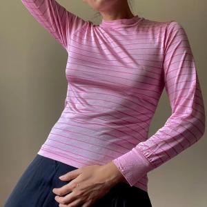 Vintage Silk Crewneck Knit - Classic Vintage 80s Fitted Crew Neck Jersey Knit Silk Top with Thin Stripe Detail. Good Condition with some signs of wear- a repaired stitch in back collar & a minor thread pull in the right chest area of the knit (see images)