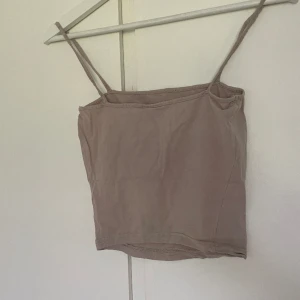 Ett linne - Ett fint linne som inte kommer till användning längre 