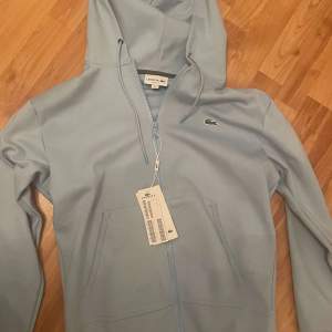 Lacoste zip hoodie storlek S 