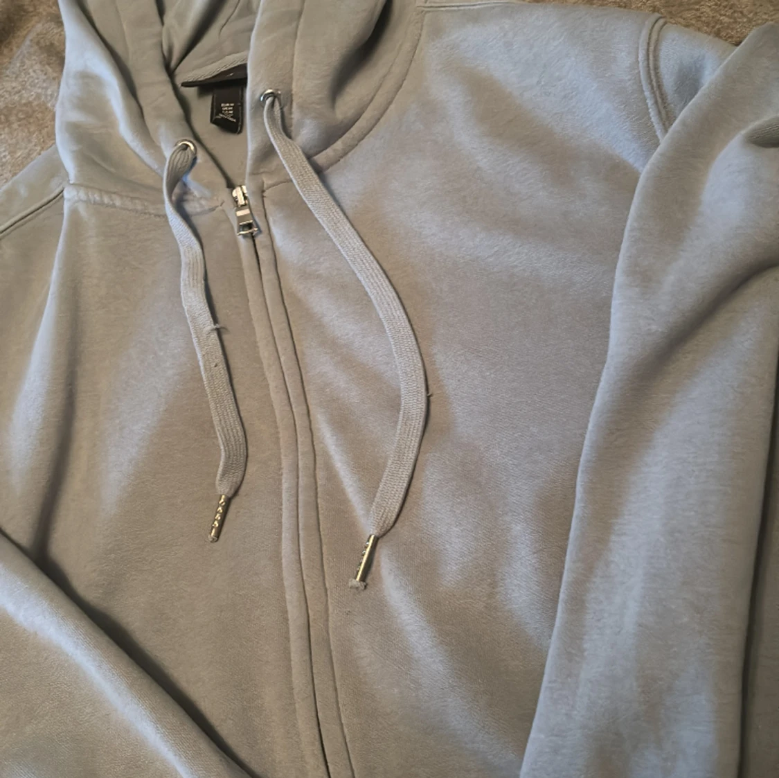 Ljusblå zipper  - 90