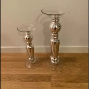 Ljustake  - Två st ljusstaken  Den stora är 45 cm hög pris 200kr Den lilla är 35 cm hög pris 150 kr