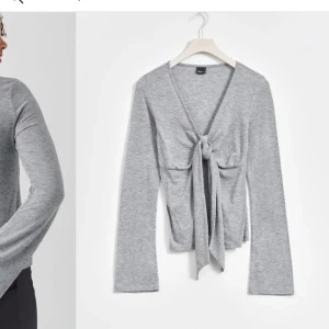 Long tie top - Populär tröja från Gina, har i svart inte grå!!!