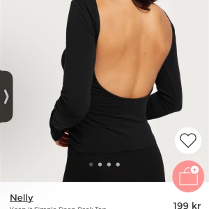 Tröja med öppen rygg från Nelly  - Knappt använd tröja med öppen rygg från Nelly. Storlek S 