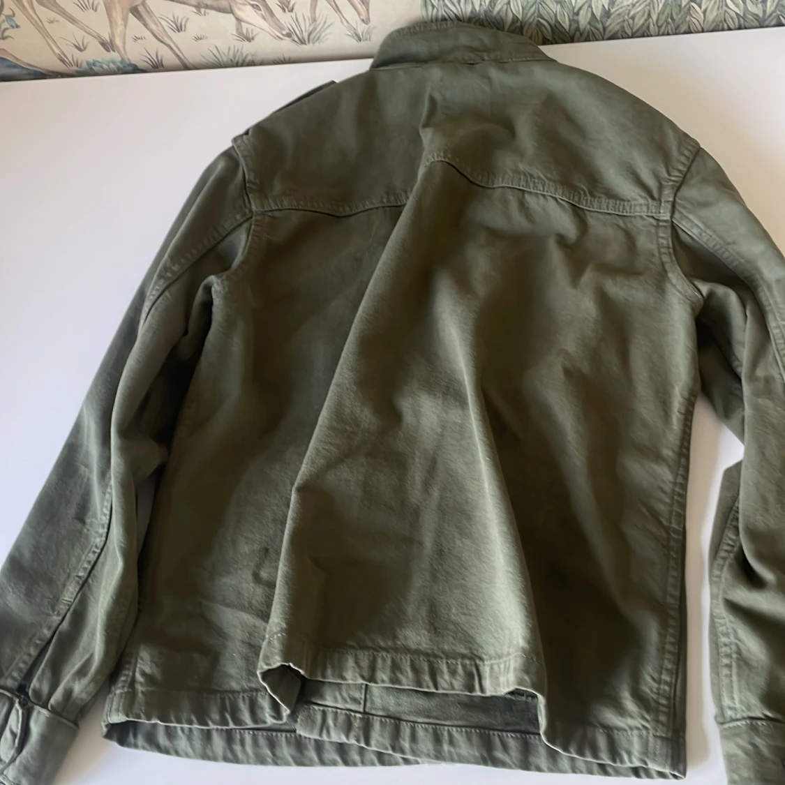 En grön jeans jacka  - 90