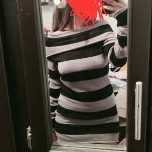 Off shoulder stripped sweater - Original price was 170 swedish crowns Very soft  Used only once but didnt like the way it sat on me Can be used as a dress