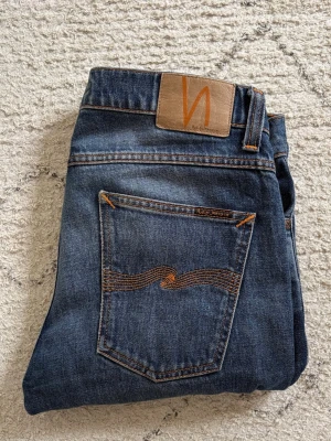 Nudie jeans Lean Dean - Nudie jeans i väldigt bra skick med snygga fades. Modell Lean Dean. Storlek W30 L32.