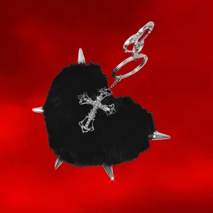 Gothic Bag Charm - Black fluffy heart-shaped bag charm with spikes and cross! 🖤💋Dimensions (heart): 10x9cm 📏In unused condition! ✨I’d advise handling with care as the spikes are a bit delicate (so make sure not to squish or bend them too hard 🤪)! Also, note that the cross moves freely as it’s only attached to the keychain and not the heart itself.