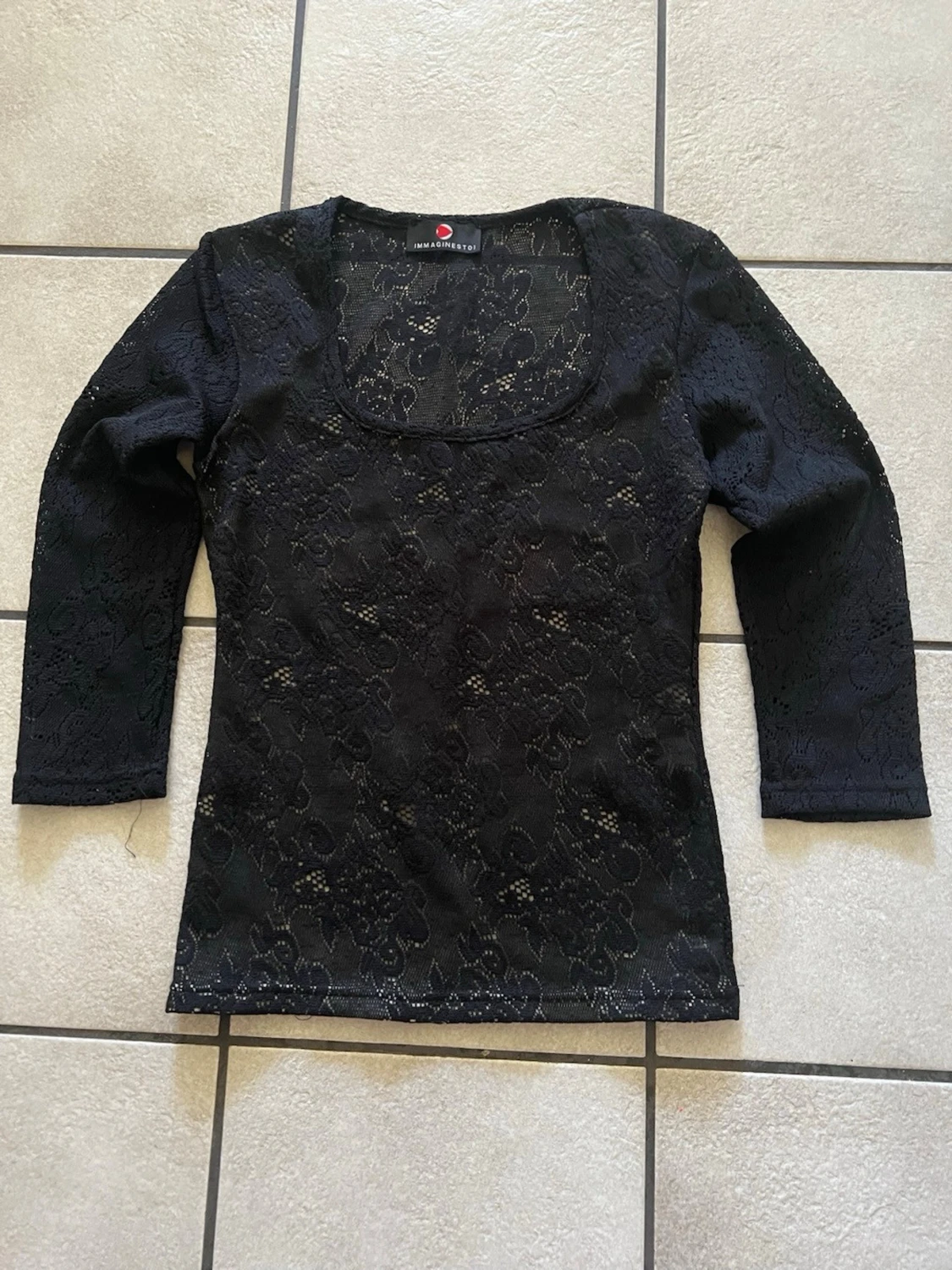 Svart spetsblus storlek S