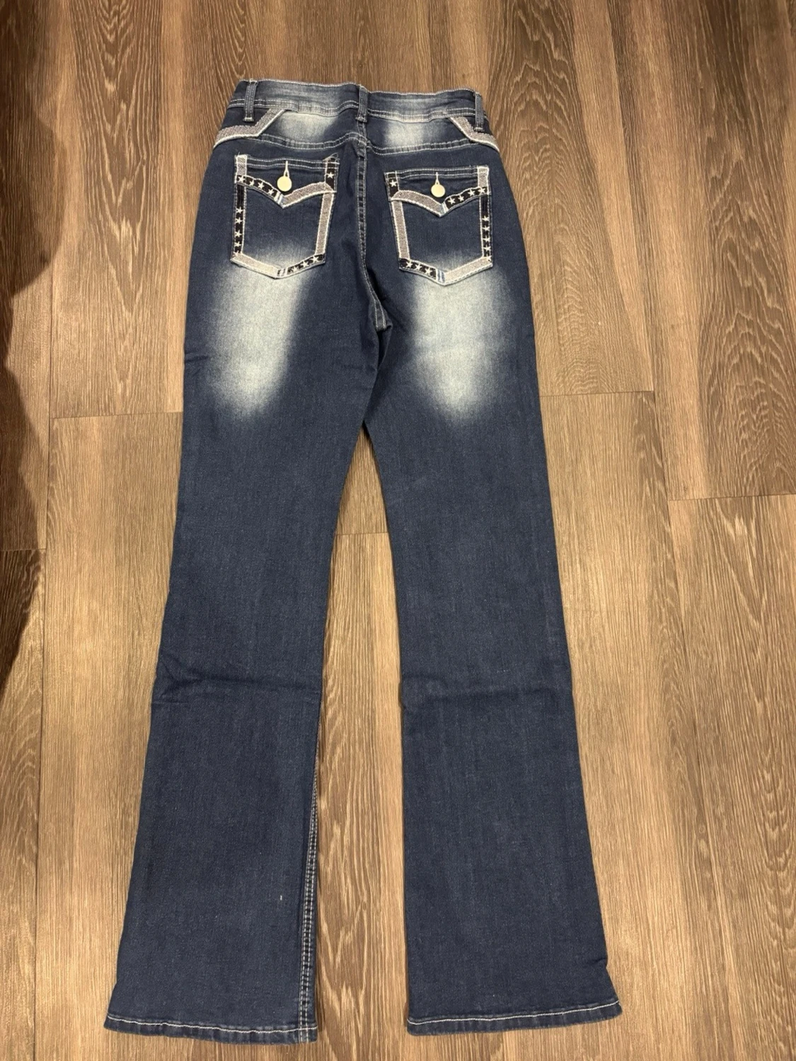 Blå bootcut jeans med stjärndetaljer - 1