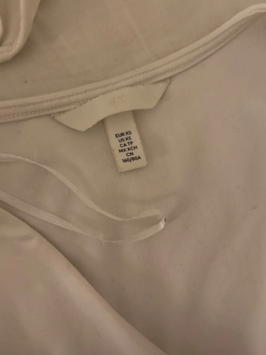 Vit långärmad body från H&M - 1