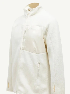 Vit fleecejacka med dragkedja - Säljer en stilren vit fleecejacka med hög krage och dragkedja framtill. Jackan har en bröstficka i blankt material och två sidofickor med dragkedja. Perfekt för lager-på-lager och riktigt mysig under kalla dagar.