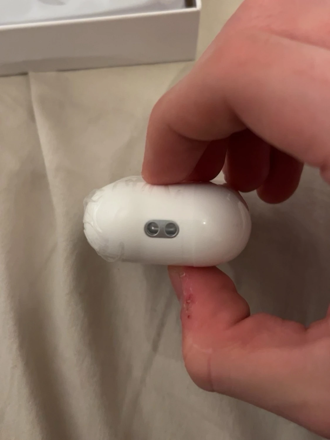Vita trådlösa hörlurar med laddningsetui - 1