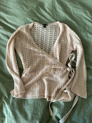 lace knit wrap cardigan  - old 2000s h&m  has some slight pilling and a stain on the strap (see photo) but its not at all visible when you wear it