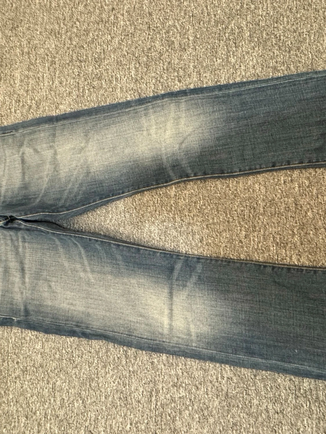 Blå Replay jeans med slitningar