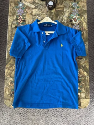 Ralph lauren piké - Sällsynt ralph lauren piké köpt i srilanka ca 15 år sedan, farsans gamla otroligt bra skick strlk M pris går diskutera!