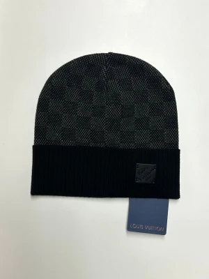 Lv Mössa - Helt ny aldrig använd. Storlek: One Size. Snabb frakt