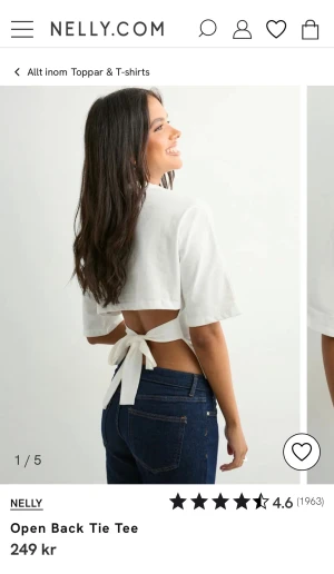 Topp med öppen rygg - Vit topp med öppen rygg. Nelly