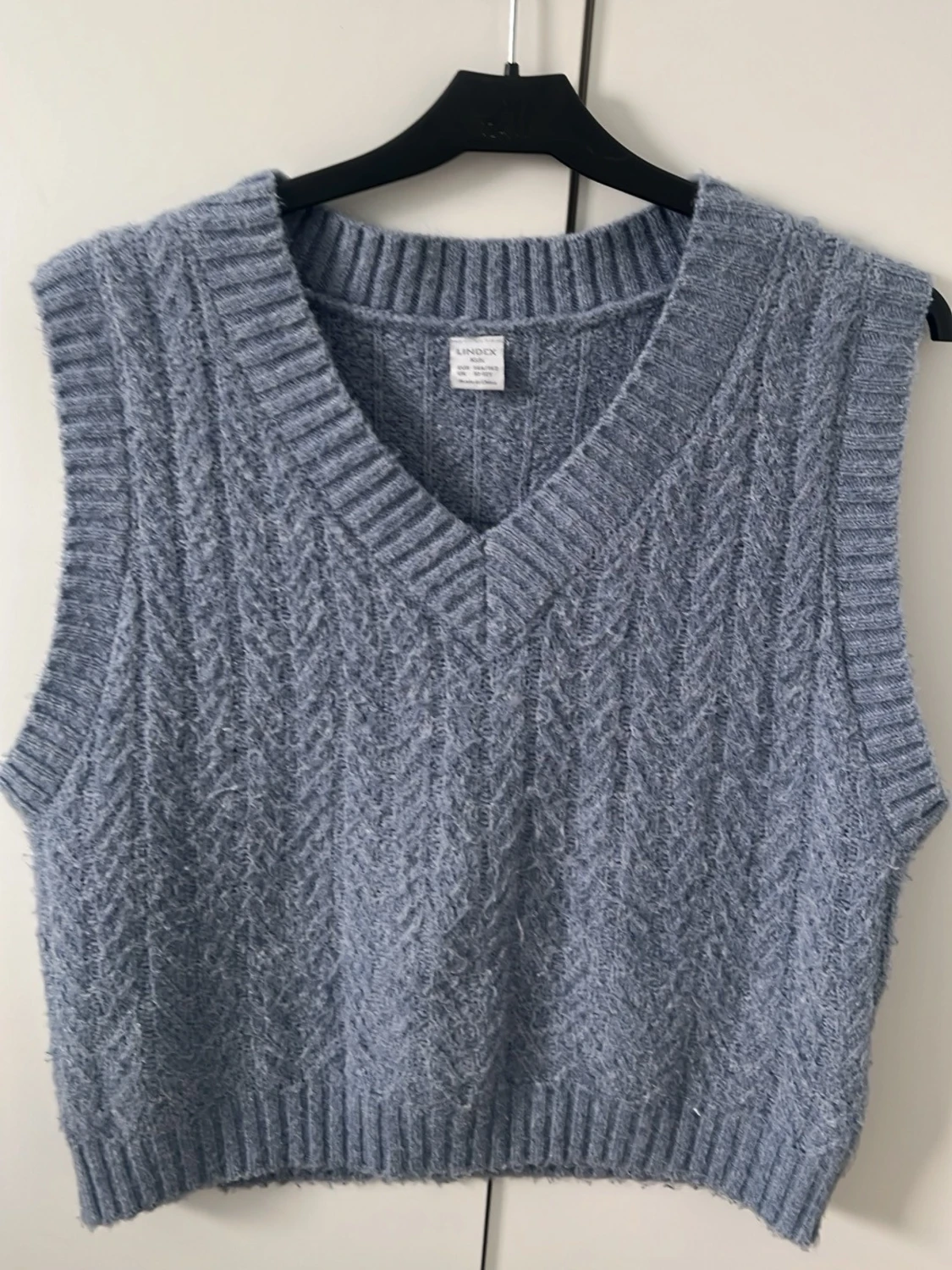 Ljusblå stickad väst från Lindex - 1