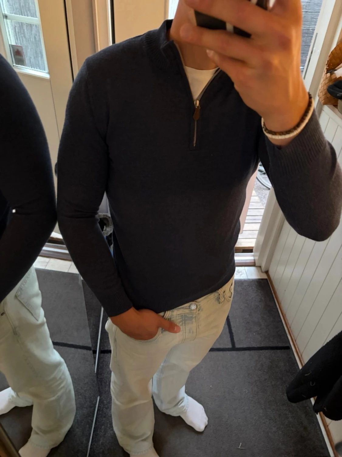Marinblå merino half zip från Stenströms