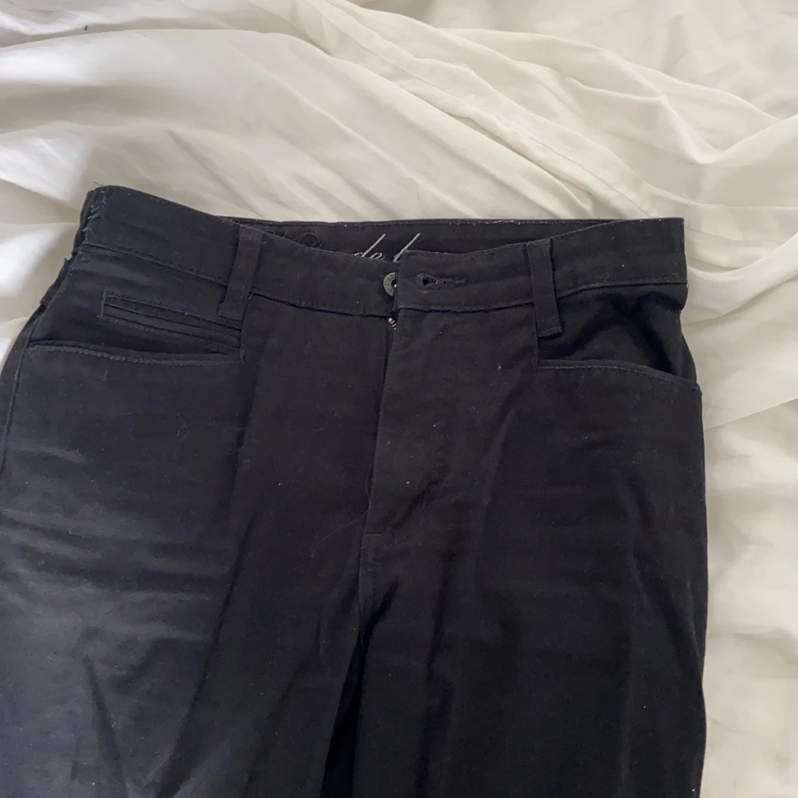 Svarta lågmidjade byxor  - 90