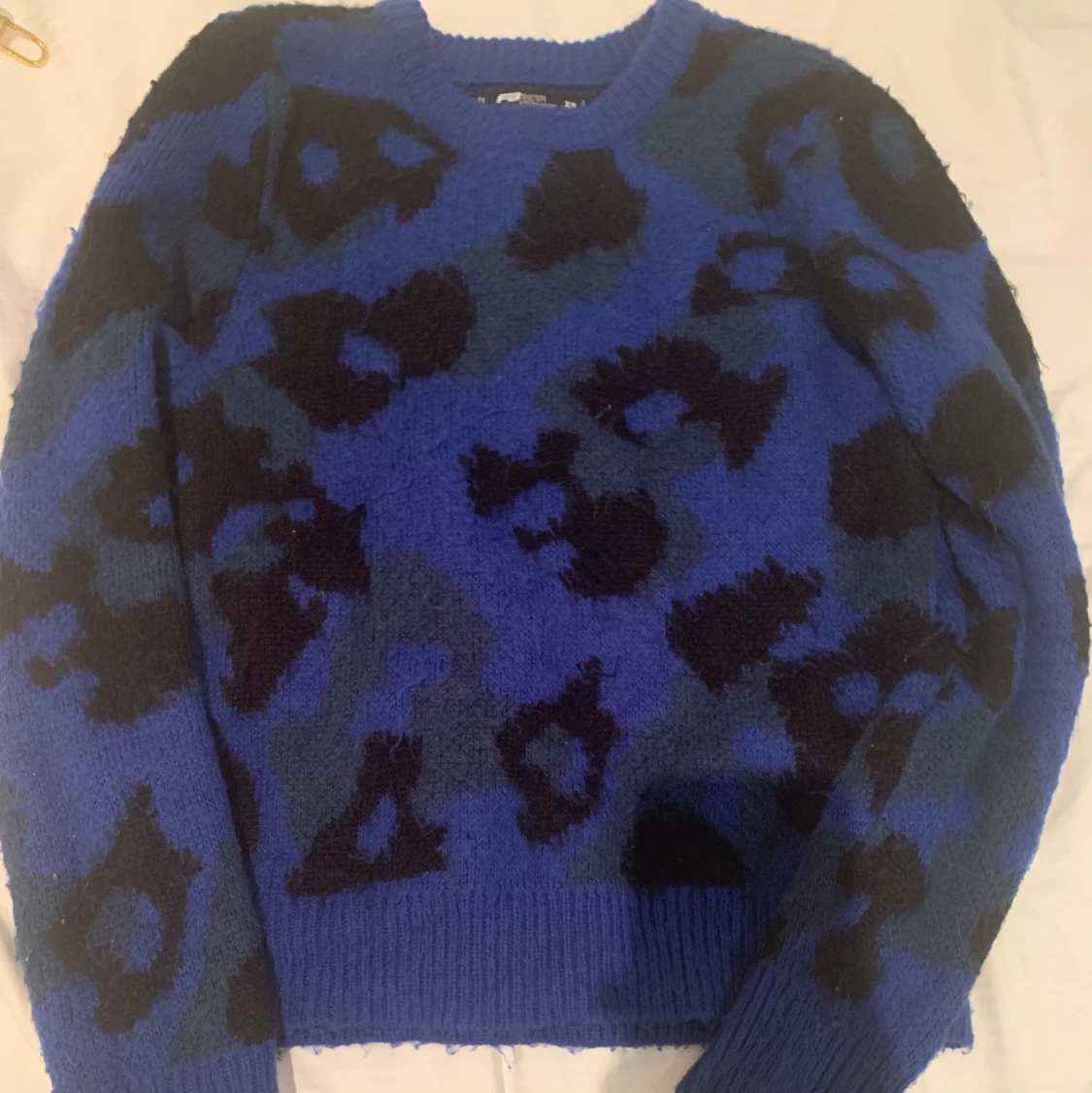 Blå stickad tröja