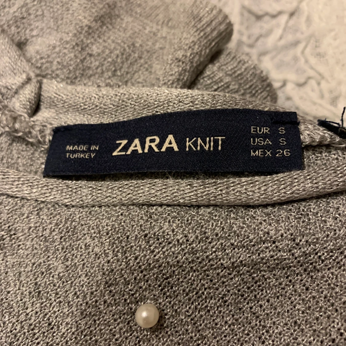 Tröja med pärlor i S - 91