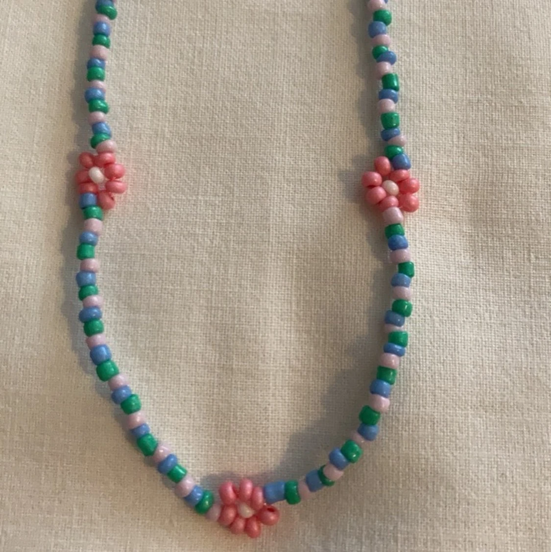 Halsband blommor - 90