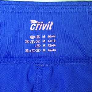 Träningstajts  - Stretchiga träningstajts som slutar under knäskålarna 