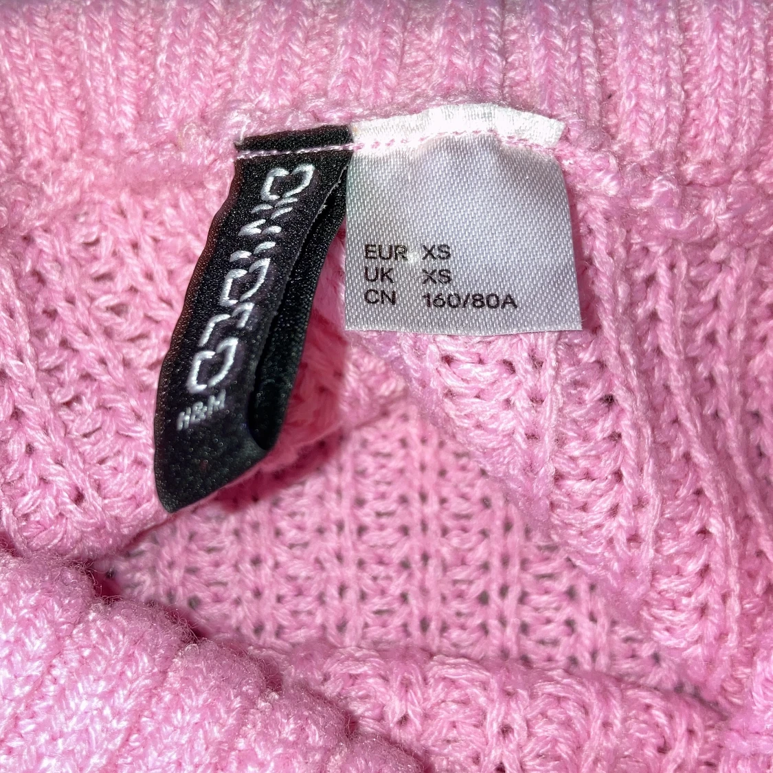 Rosa stickad tröja  - 91