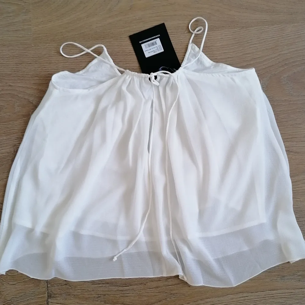 New Charlotte Eskildsen Monica top.  Size 34.  Polyester, lining 100% cotton.. Blusar.