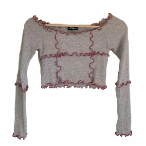 contrastitch tröja - supersnygg och unik topp med trendiga sömmar i rosa! 