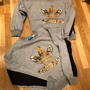 Adidas sweatshirt * 2 - Två sweatshirts från adidas colab med Rita Ora, aldrig använda. Ena storlek 36/Small och andra 38/Medium. Bilderna visar framsida och baksida av tröjan. Pris är per styck. 