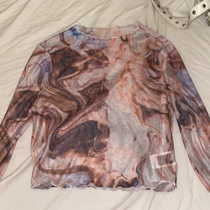 Genomskinlig topp - Superfin genomskinlig topp som aldrig har andvänts. Den är i storlek M men passar S också.