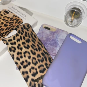 Mobilskal för iPhone 7 Plus  - Ett lila från Holdit och två andra från ideal of sweden, det lila är det senaste inköpta som knappt är använd. De andra är använda men endast någon liten slitning.