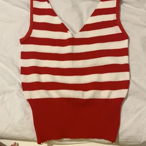 Säljer linne - Säljer rött och vitt linne pgr använder alldrig så. (Aldrig använt)