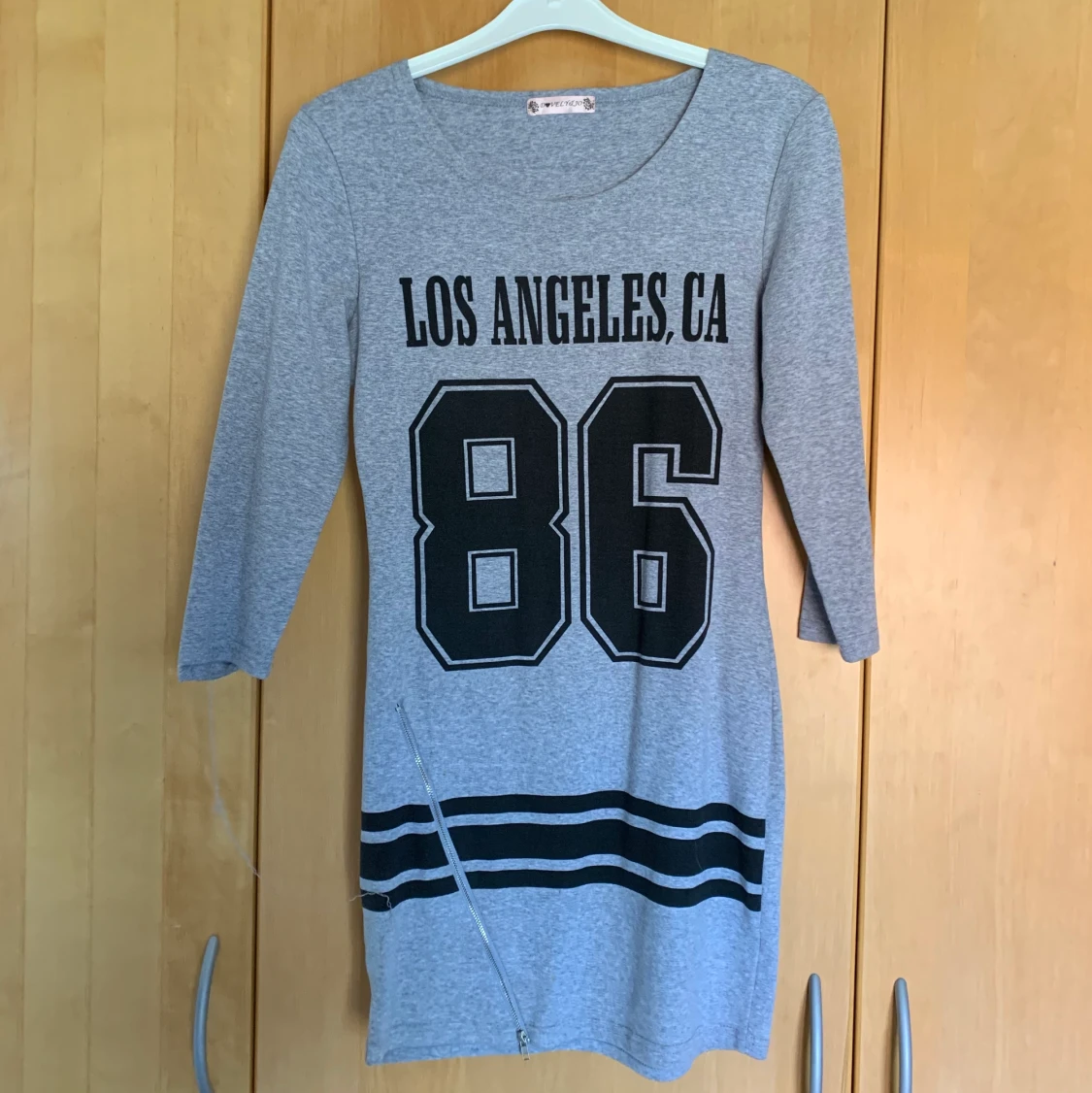 Grå klänning i storlek S